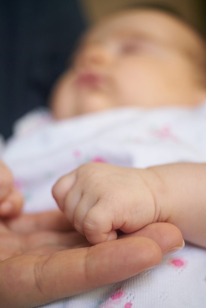baby holding hand